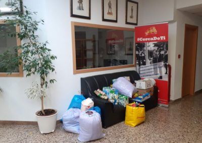 Entrega de alimentos en el Cottolengo del Padre Ale
