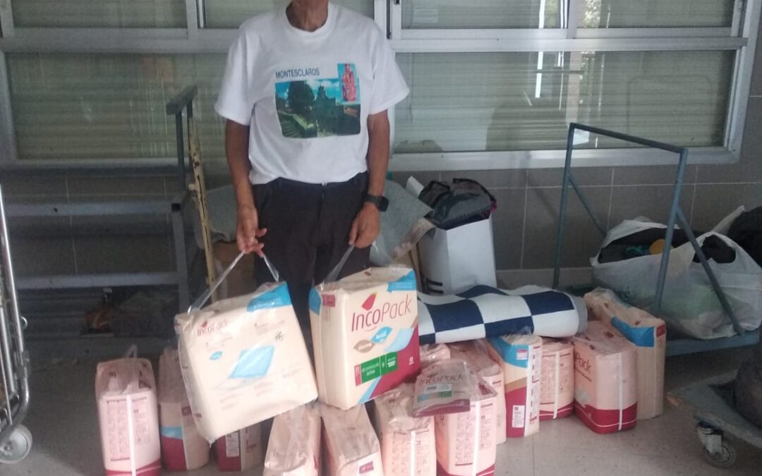 Entrega mensual al Cottolengo Padre Alegre